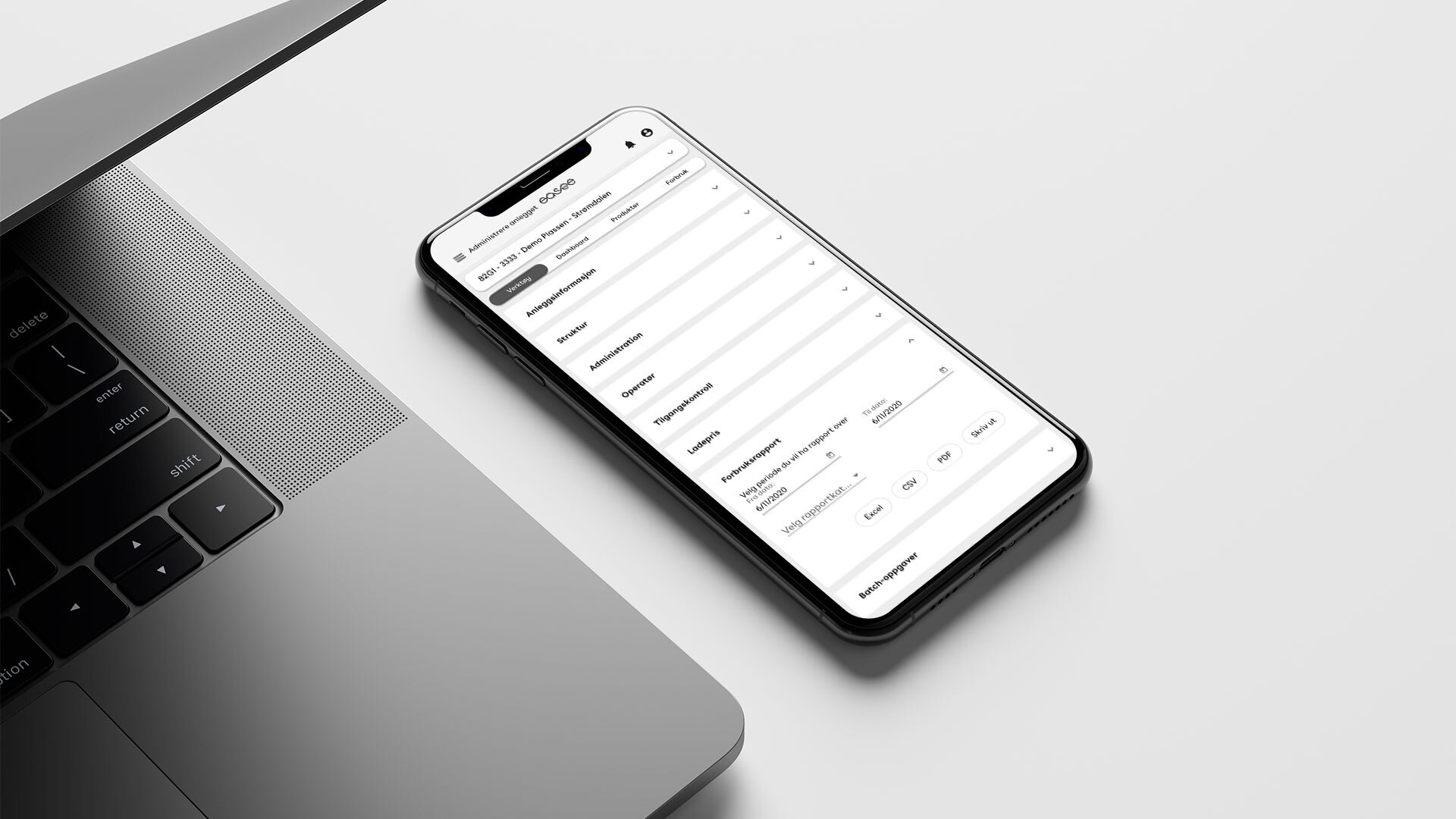 Bærbar PC og telefon med administrasjonsverktøyet Easee Control
