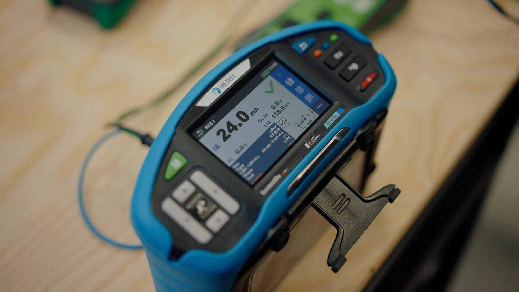 A Metrel RCD measuring device, showing 24.0 mA