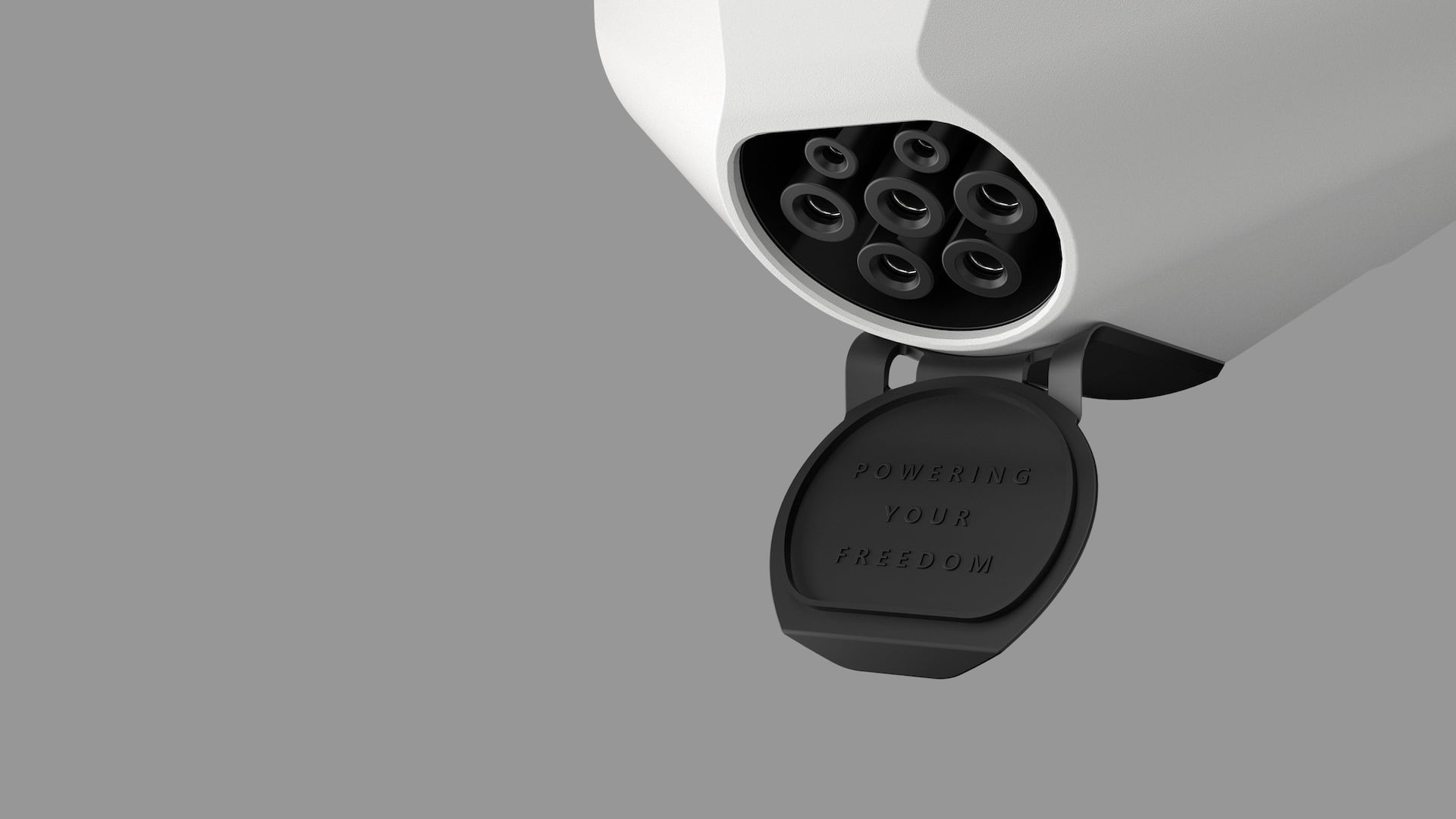 The lid of the electric car charger has the text powering your freedom