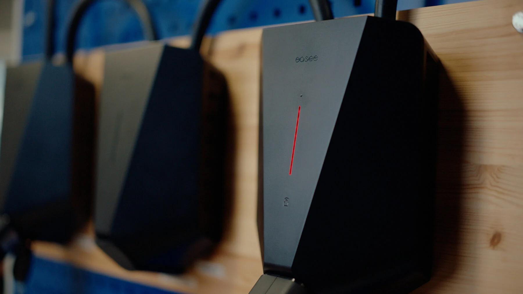 An EV charger in a lab with a red LED light